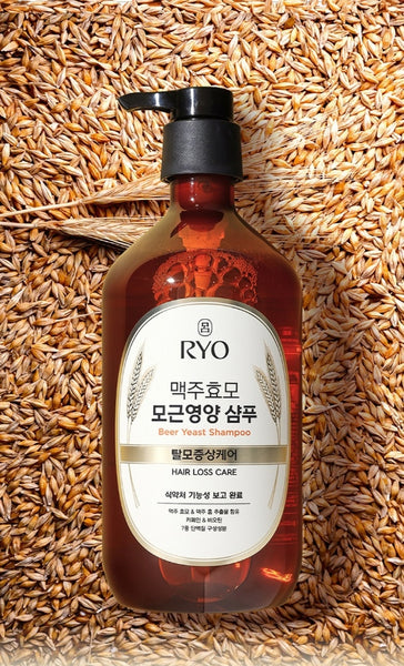 Bottle of RYO beer yeast shampoo on a textured background