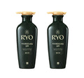 Two black RYO shampoo bottles with gold caps on a white background