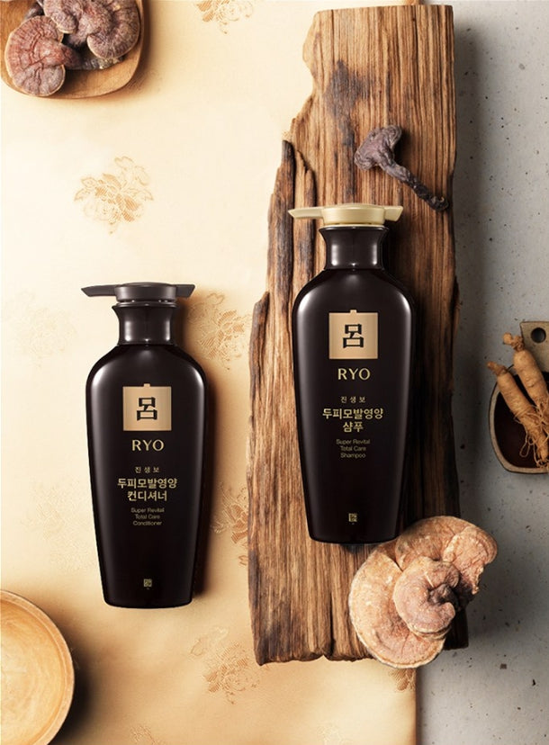 Two black bottles with 'RYO' branding on a wooden surface with natural elements.